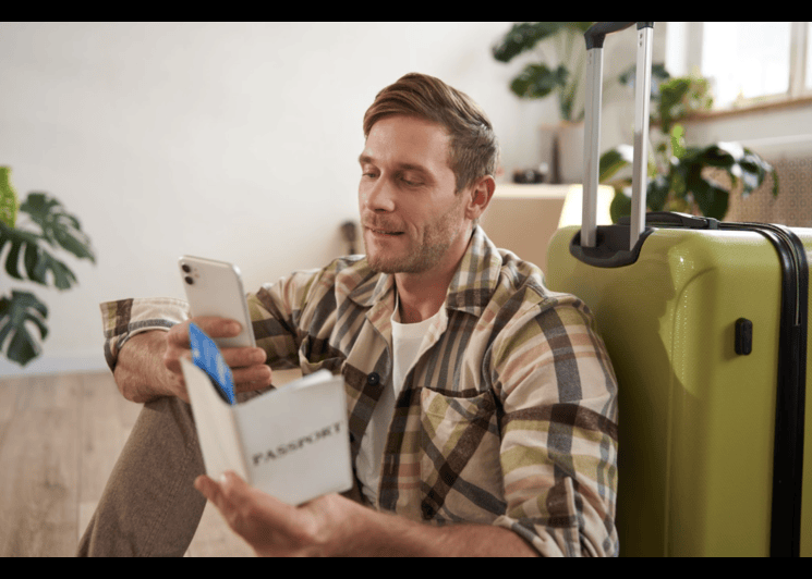 Traveler reviewing a travel budget on phone