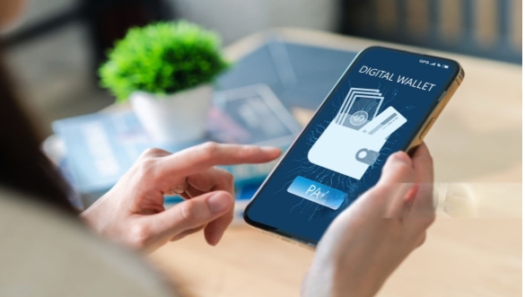 Person making digital payments using a digital wallet on a smartphone