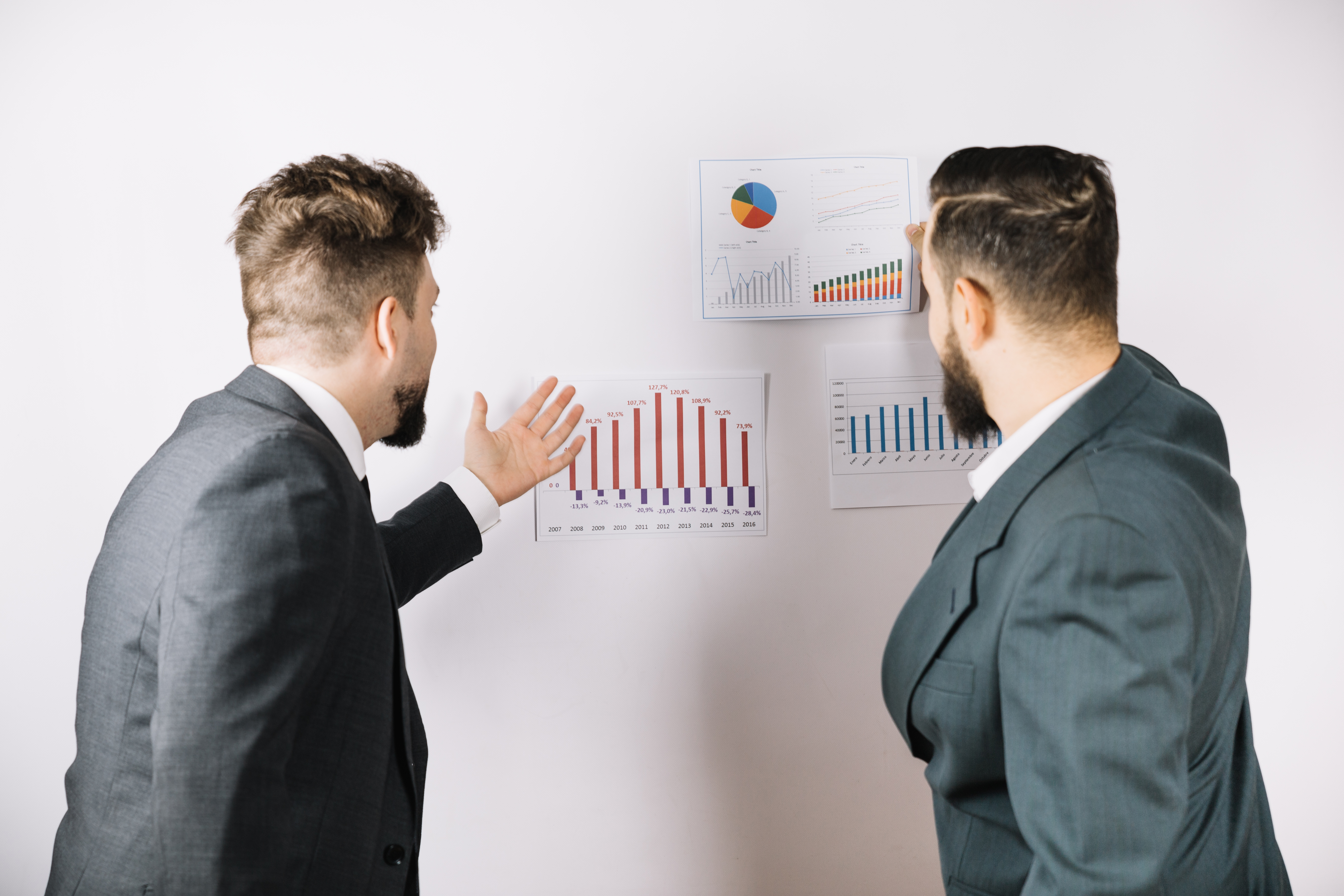 business owners reviewing profit and loss data