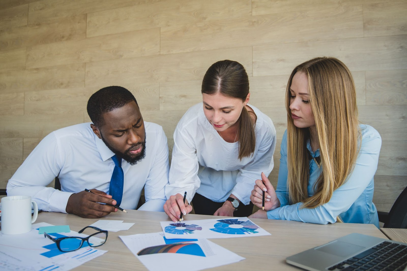 Team comparing wire transfer vs bank transfer