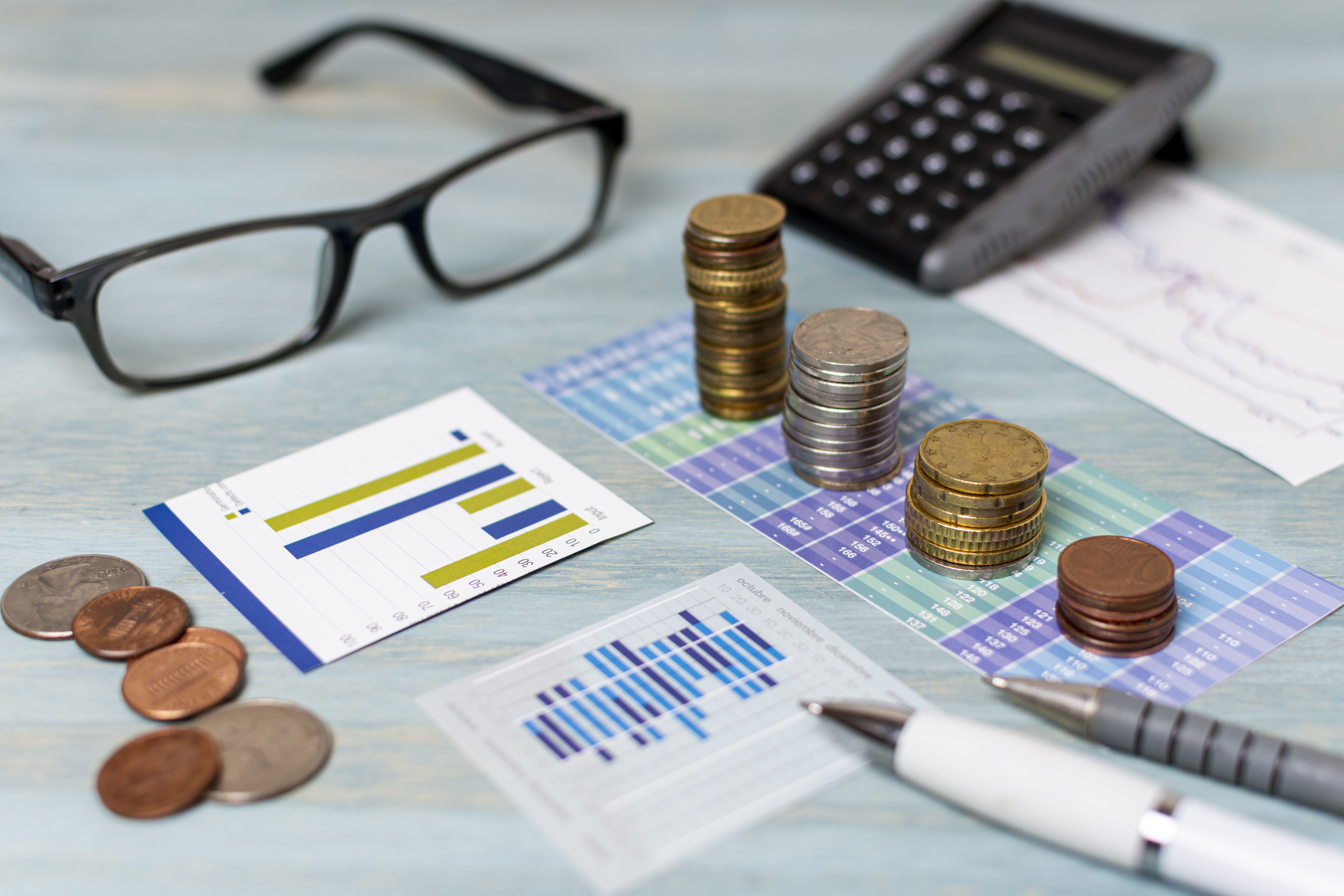 reading-glasses-piles-coiSpend management, planning and moneyns-high-view Spend management, planning and money