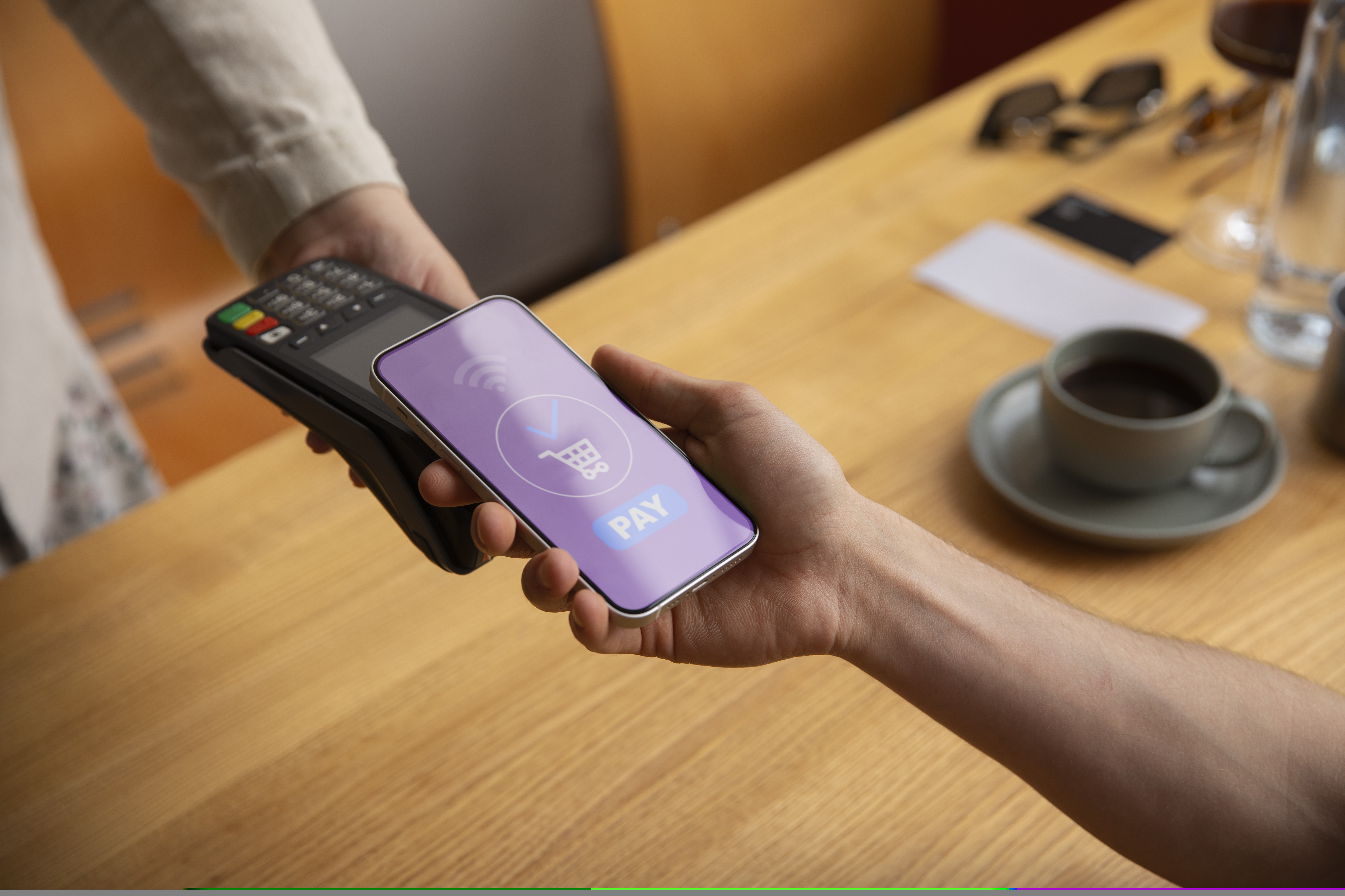 a person making contactless payments 