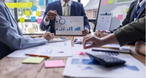  team analyzing company spend control data for better spend management